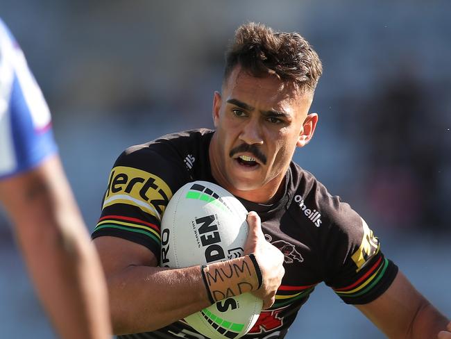 SYDNEY, AUSTRALIA - SEPTEMBER 26: Daine Laurie of the Panthers is tackled during the round 20 NRL match between the Canterbury Bulldogs and the Penrith Panthers at ANZ Stadium on September 26, 2020 in Sydney, Australia. (Photo by Matt King/Getty Images)