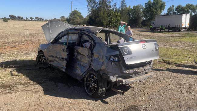 The Mazda hatchback which was hit by the truck at Angle Vale. Picture: Jason Katsaras