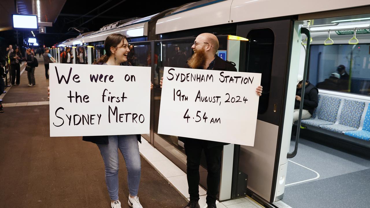 Pictured at Sydenham Station is Brigitte Myers and Mark Fleming who were among the first passengers on the brand new Sydney Metro on its maiden run to Tallawong at 4.54am. Picture: Richard Dobson