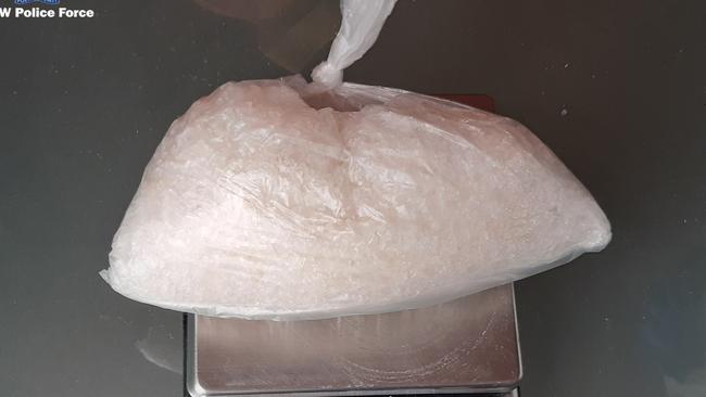 Police allege a bikie was involved in 25kg of ice and heroin supply.