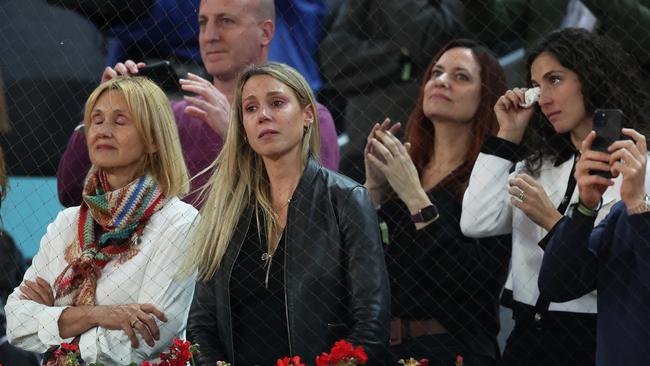 Nadal's mother Ana Maria Parera (L), sister Maria Isabel Nadal (C), wife Maria Francisca Perello (R) watch on as Nadal waves goodbye. (Photo by Clive Brunskill/Getty Images)