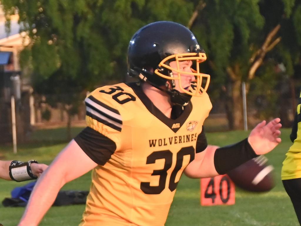 Running back Jack Grayson (number 30) has been huge for the Rockhampton Wolverines in this campaign. Photo: George Vartabedian