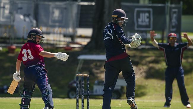 TSS Keeper Max Kemp and BSHS’s Calem McCathie during round 4 of GPS cricket. Picture: Glenn Campbell