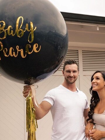 Kayla and Tobi hosted a balloon popping ceremony. Picture: Instagram.