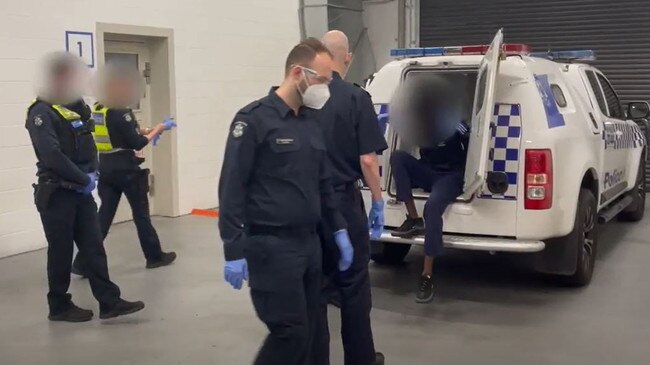 A male is arrested over an alleged violent attack in Carlton. Picture: Victoria Police