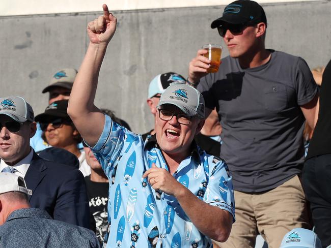 Prime Minister Scott Morrison watching his team the Cronulla Sharks play against Canberra Raiders at PointsBet Stadium on Fathers Day with his daughter Lily. Picture: Jonathan Ng