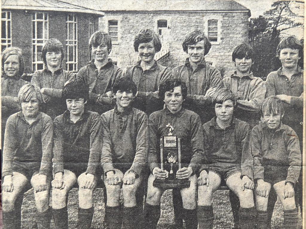 St Patrick’s College under-13 rugby union team with their trophy after winning the grand final against Goulburn. Neale Daniher was voted best and fairest for the season.