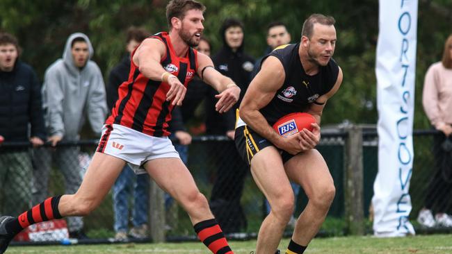 Josh Walker (right) proved the headline act on Good Friday with six goals for Balwyn. Picture: Davis Harrigan