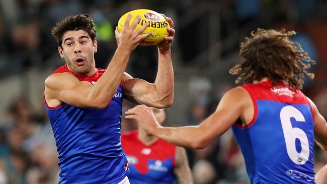 Christian Petracca takes a mark as it becomes apparent it’s all one-way traffic. Picture: AFL Photos via Getty Images