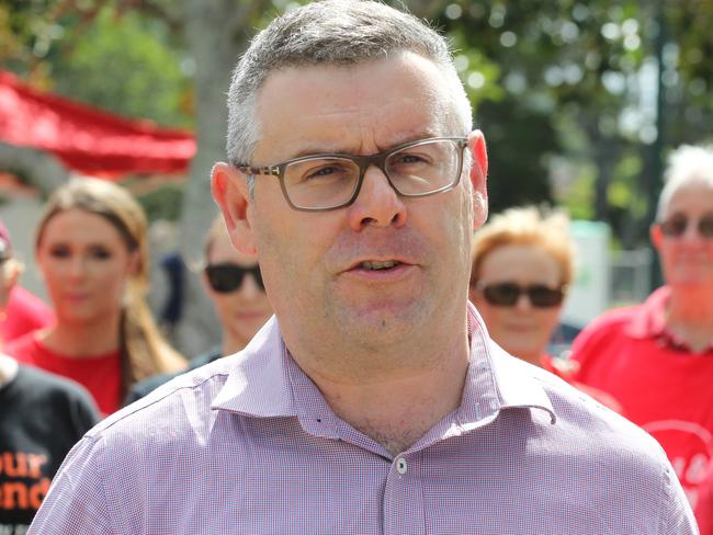 Labor Senator Murray Watt and Labor supporters  during a rally in Labrador to protest the penalty cuts.Picture Mike Batterham