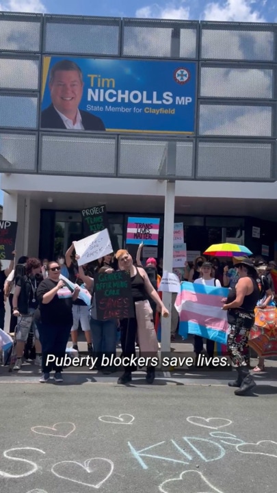 'Puberty blockers save lives' protestors outside Health Ministers office on Wednesday