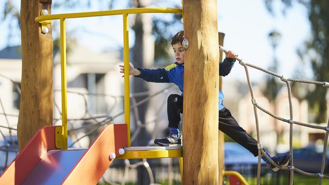 Luca stretching out to reach the slide at Roy Amer Reserve. Picture: Matt Loxton