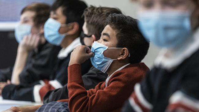 Masks will continue to be required indoors and outdoors in Melbourne at 70 per cent double vaccination rates.