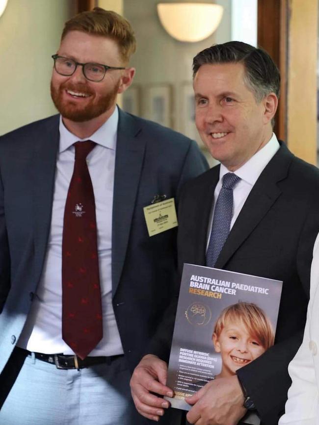 Professor Matt Dun (left) presenting a submission for funding to federal Health Minister Mark Butler. Picture: Supplied