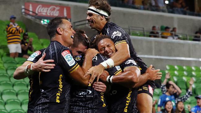 Byron Ralston of the Force celebrates scoring a try with his teammates. Photo by Kelly Defina/Getty Images