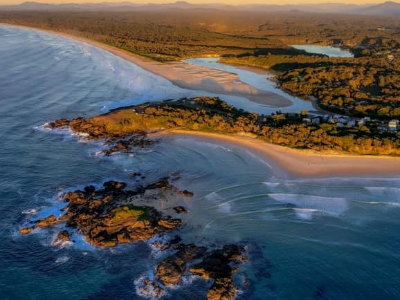 Sharne Chandra Arena captured the Sawtell Headland at sunrise. Coffs cover image.