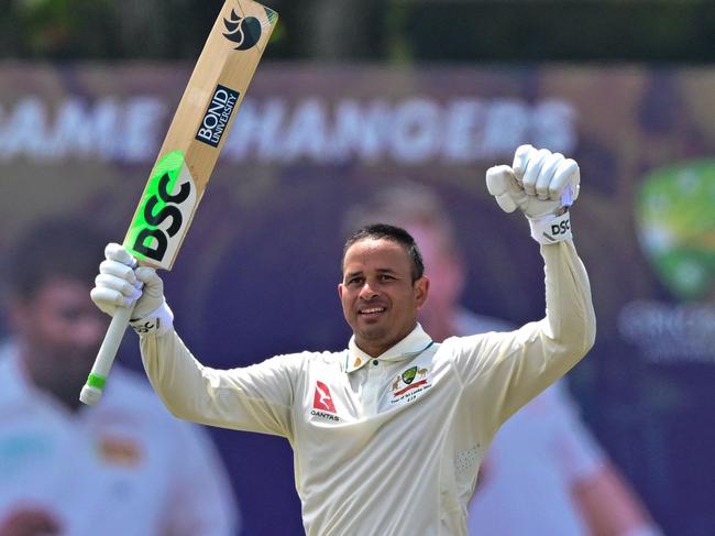 Australia's Usman Khawaja celebrates after scoring a double century (200 runs) during the second day of the first Test cricket match between Sri Lanka and Australia at the Galle International Cricket Stadium in Galle on January 30, 2025. (Photo by Ishara S. KODIKARA / AFP)