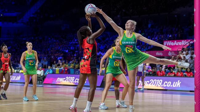 Malawi’s Sindi Simtowe attempts to shoot over the Australia’s Courtney Bruce