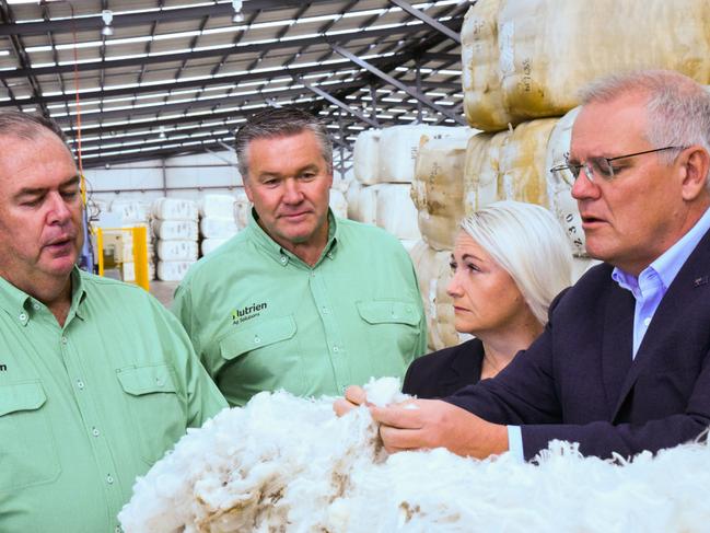 Nutrien Ag Solutions GM John Tuskin and state wool manager Stewart Raine with Liberal candidate for Lyons Suzie Bower and Prime Minister Scott Morrison at Nutrien's Evandale wool storage facility. Picture: Alex Treacy