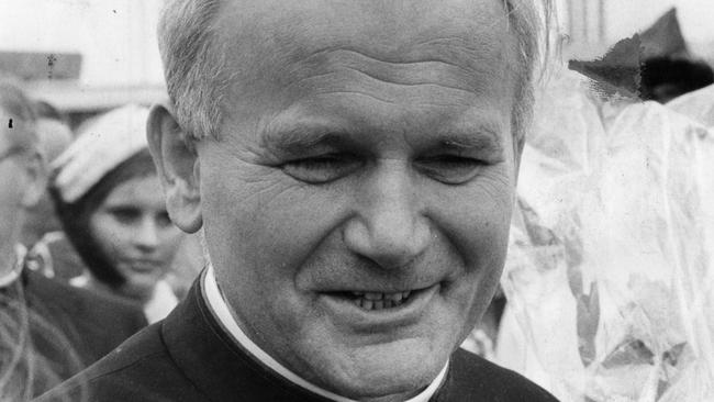 Cardinal Karol Jozef Wojtyla, later Pope John Paul II, is greeted by members of the SA Polish community after arriving at Adelaide Airport in 1973.