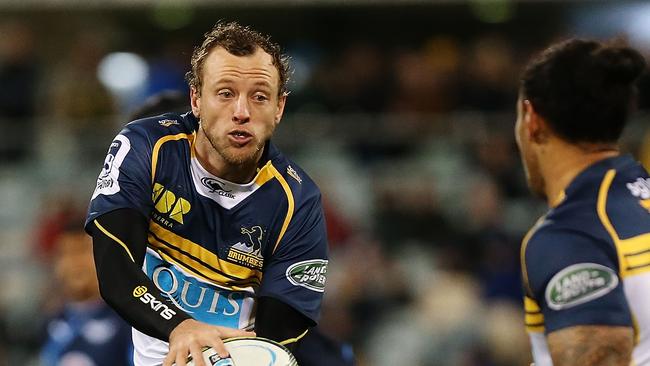 CANBERRA, AUSTRALIA - MAY 29: Jesse Mogg of the Brumbies passes the ball during the round 16 Super Rugby match between the Brumbies and the Bulls at GIO Stadium on May 29, 2015 in Canberra, Australia. (Photo by Stefan Postles/Getty Images)