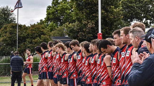 The Blues (pictured unfurling the 2022 Division 3 flag) are unbeaten to start life in a new division. Picture: Waverley Blues FC