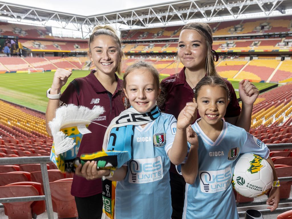 L-r) Hollie Palmer (Brisbane Roar), Ines Lockwood (7 - Brisbane City FC), Amali Kinsella (FQ QAS program) and Isla Smith (8 - Brisbane City FC) are all smiles about the 2023 FIFA Women’s World Cup being co-hosted by Australia and New Zealand.