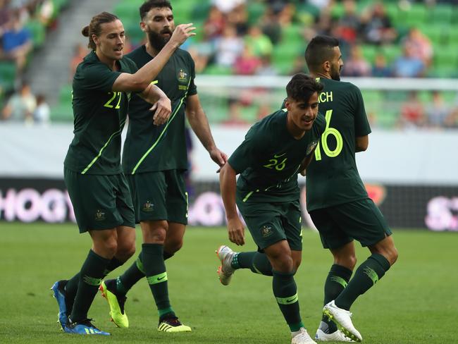 Daniel Arzani of Australia celebrates after scoring a goal