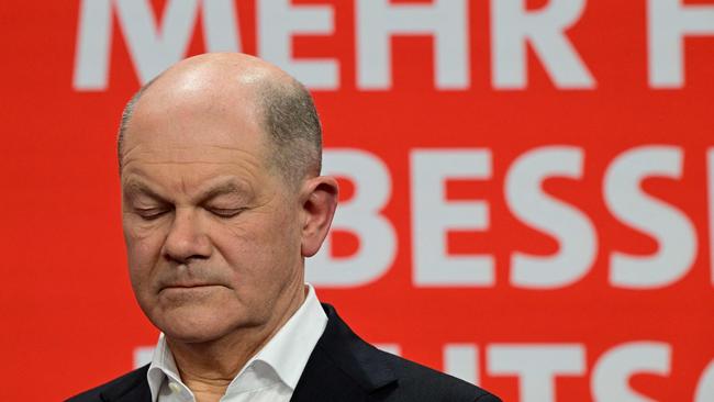 German Chancellor Olaf Scholz looks dejected as he speaks on stage during an election evening at Germany's Social Democratic Party’s headquarters in Berlin. Picture: John MacDougall/AFP