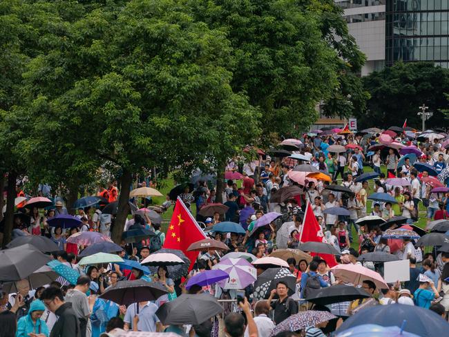 Pro-Beijing supporters gather in Hong Kong. Picture: Getty