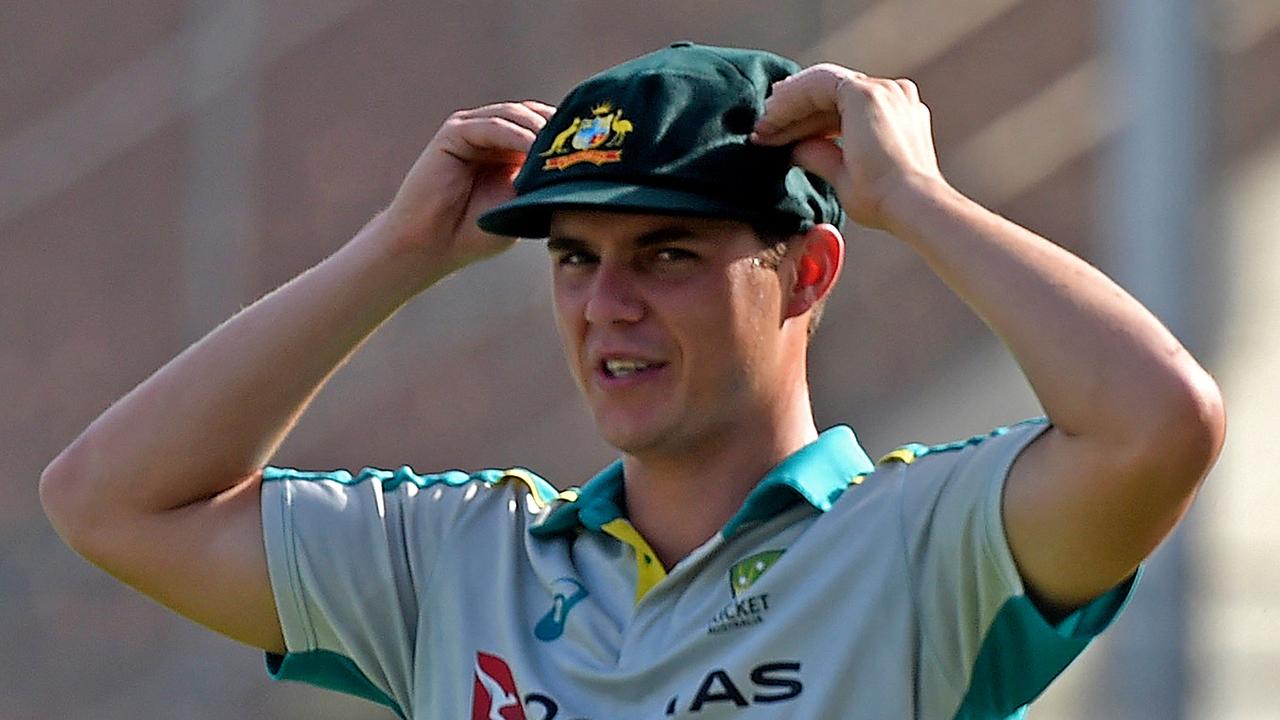 Australia's Mitchell Swepson exercises before the start of the first day play of the second Test cricket match between Pakistan and Australia at the National Cricket Stadium in Karachi on March 12, 2022. (Photo by Asif HASSAN / AFP)