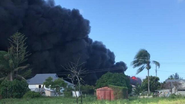 Explosions and billowing smoke from the early stages of the Kalkie truck depot fire.