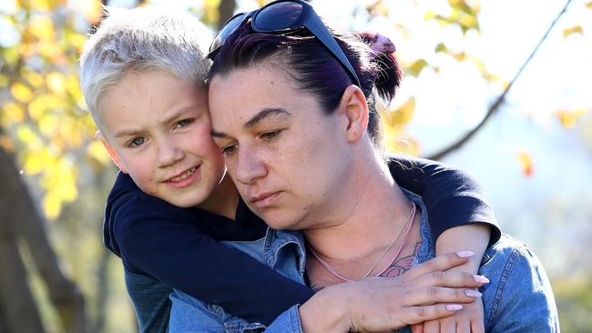 Tanyka Ford, mother of the twin girls who tragically died in a house fire at Batlow, with her surviving son Dominick. Picture: Toby Zerna