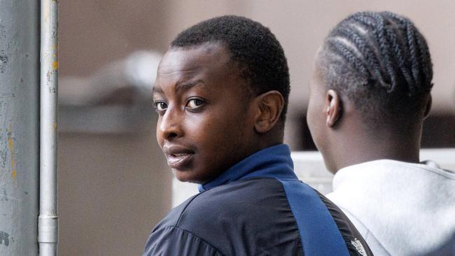 Mohamed Buram (left) was supported in court by family members. Picture: NewsWire / David Geraghty