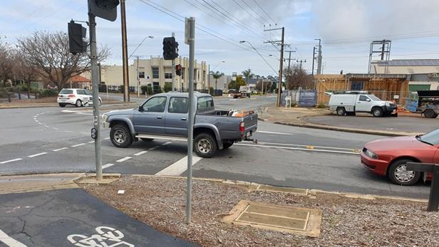 The ute is too far over the white line to trigger the loop.