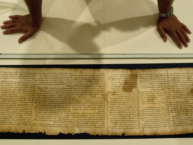 Part of the Isaiah Scroll, one of the Dead Sea Scrolls, inside the vault of the Shrine of the Book building at the Israel Museum in Jerusalem. Picture: AP