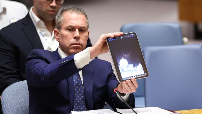 Israeli Ambassador to the UN Gilad Erdan shows a video of drones and missiles heading toward Israel during a UN Security Council meeting on the situation in the Middle East. Picture: AFP