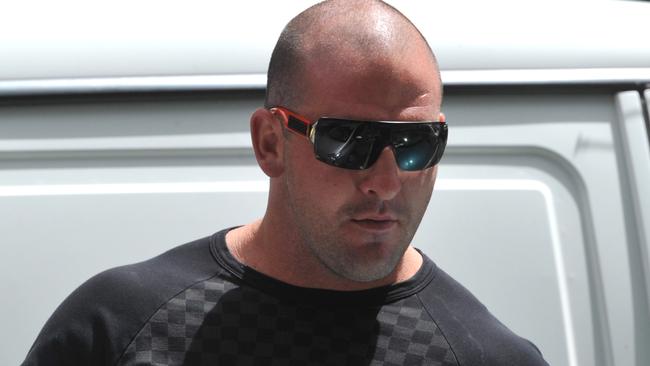 Mark Buddle leaves the Melbourne Magistrates Court in 2012 after appearing on charges relating to a brawl at strip club Spearmint Rhino. Picture: AAP