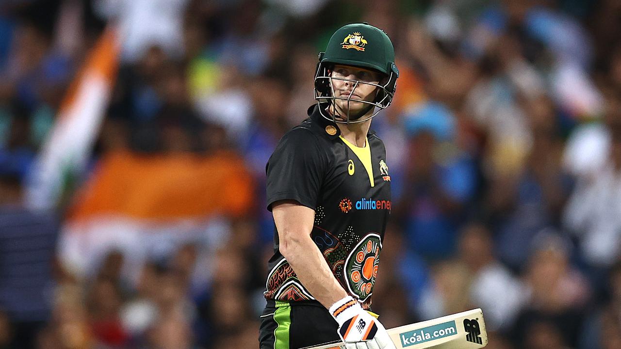 SYDNEY, AUSTRALIA - DECEMBER 08: Steve Smith of Australia looks dejected after being dismissed by Washington Sundar of India during game three of the Twenty20 International series between Australia and India at Sydney Cricket Ground on December 08, 2020 in Sydney, Australia. (Photo by Ryan Pierse/Getty Images)