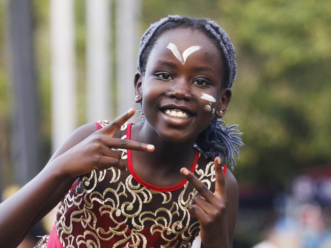 Abuk Garang, 8, enjoys the Cairns African Festival, held at Forgarty Park on Saturday. Picture: Brendan Radke