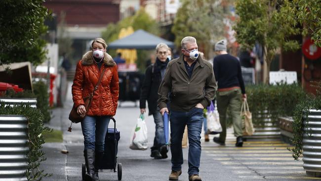 Melburnians have been urged to wear a mask when in public, especially if social distancing is not possible. Picture: Daniel Pockett