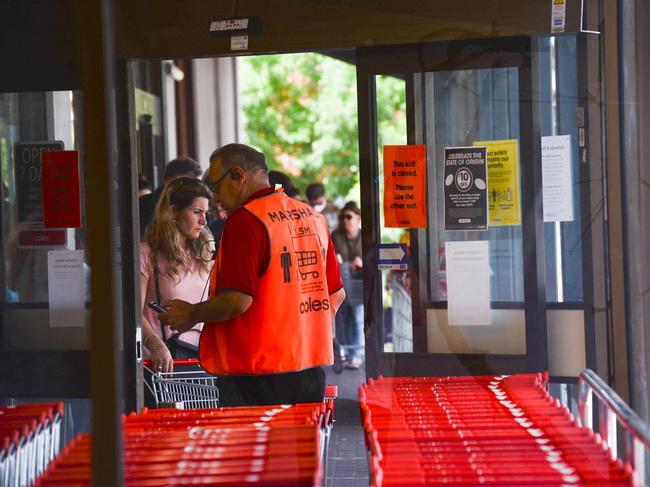 People line up outside Coles at Blackwood ahead of the lockdown. Picture: Ben Brennan