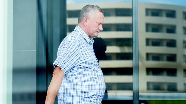 Sports scientist Stephen Dank, who was at the centre of the Essendon Football Club supplements scandal, leaves a health clinic in Darwin. Picture: Elise Derwin