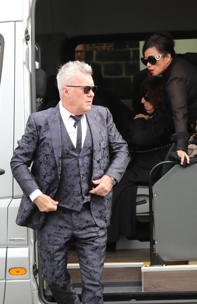 Jimmy Barnes arrives with wife Jane. Picture: Alex Coppel.