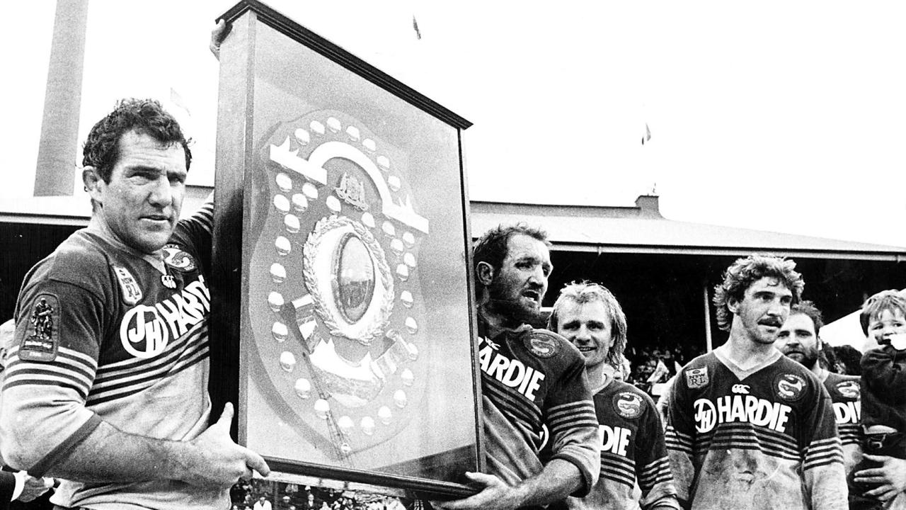 Parramatta’s 1986 premiership team featured a stack of stars, (L-R) Mick Cronin and Ray Price holding JJ Giltinan Shield flanked by Peter Sterling &amp; Brett Kenny. Picture: Peter Kurnik