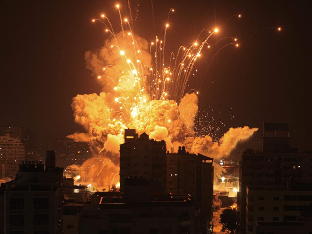 A missile explodes in Gaza City during an Israeli air strike on October 8, 2023. Picture: AFP