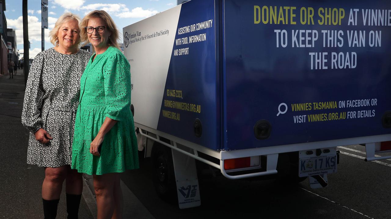 Volunteer Bev Thompson (L) with CEO of St Vincent de Paul Society Heather Kent stand with one of the new Loui's Van. Picture: Nikki Davis-Jones