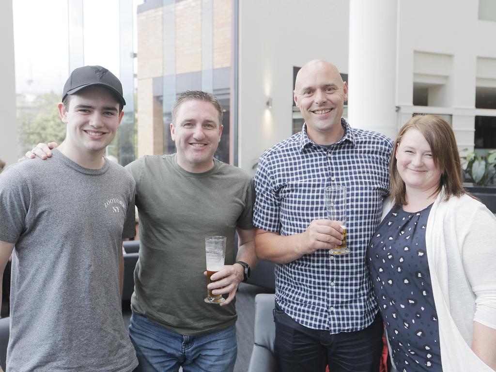 Jye Kahan, of Melbourne, left, Brett Kahan, of Melbourne, Jason Templar, of Geelong, and Kellie Templar, of Geelong, at the Grand Chancellor Hotel for the UTAS graduation ceremonies. Picture: MATHEW FARRELL