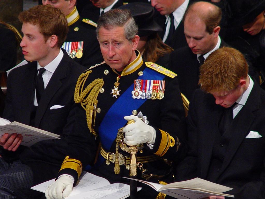 The Prince of Wales, flanked by his sons William (left) and Harry, during the funeral for Queen Elizabeth, The Queen Mother, in Westminster Abbey. Picture: AFP