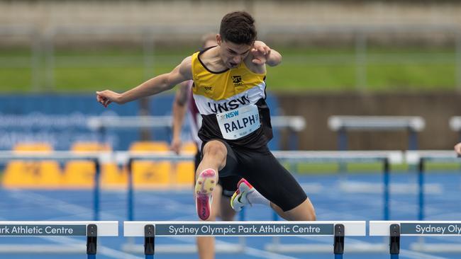 Josh Ralph from Redfern on his way to a 400m hurdles win.